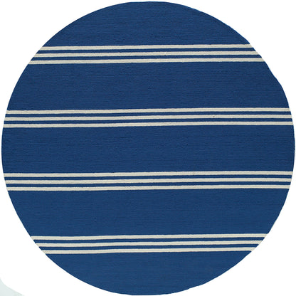 Round blue woven rug with cream striped bands across, nautical style.