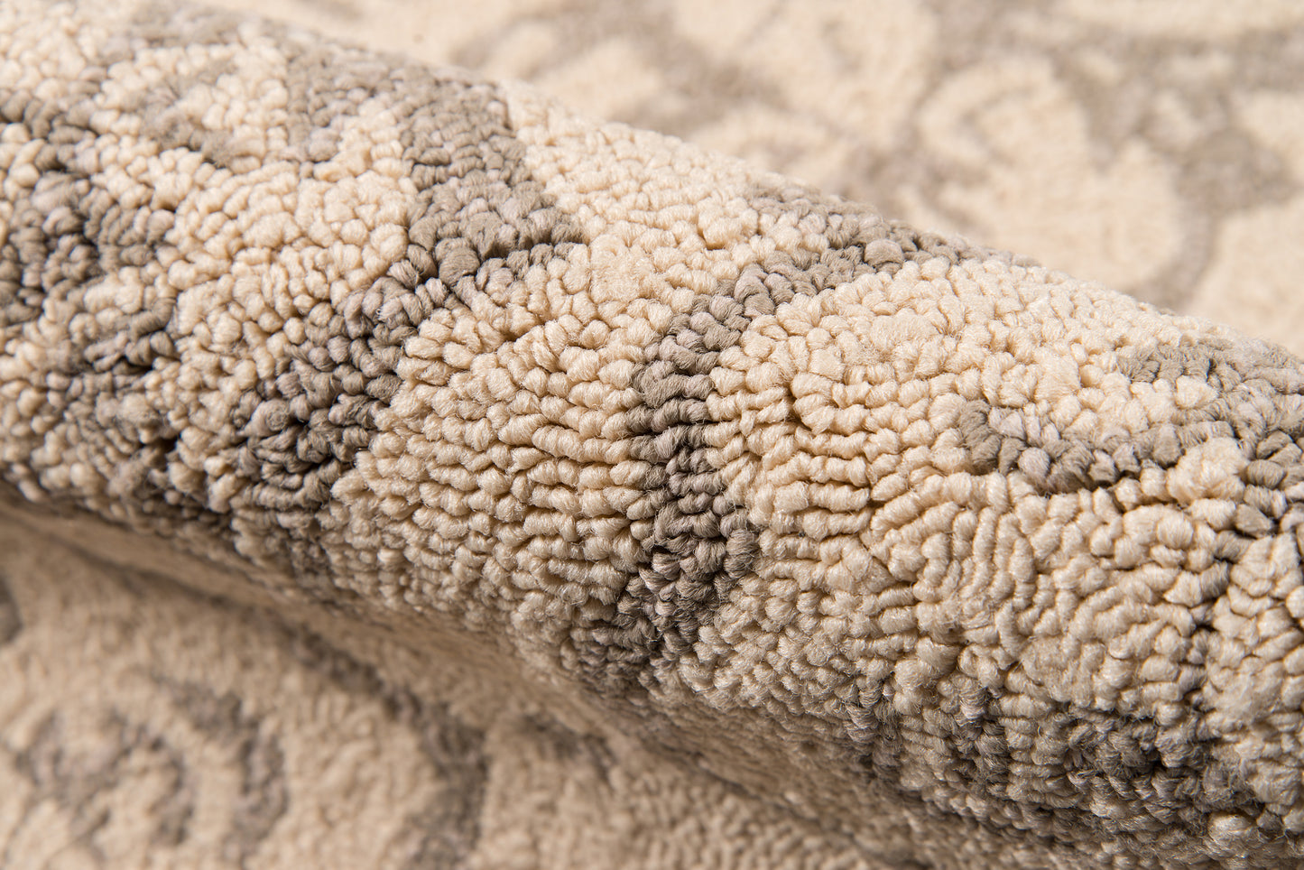 Taupe-gray plush boucle rug close-up with thick textured pile, 4' x 6' size, cozy shag-style for living rooms.