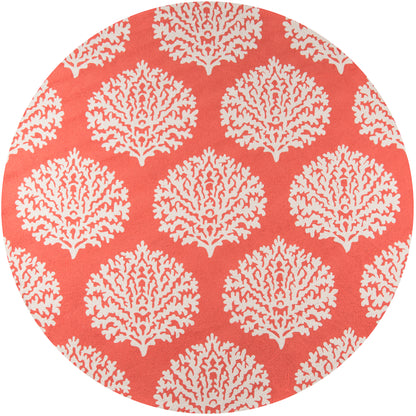 Round rug with white coral reef motifs on a coral background, coastal decorative floor covering.