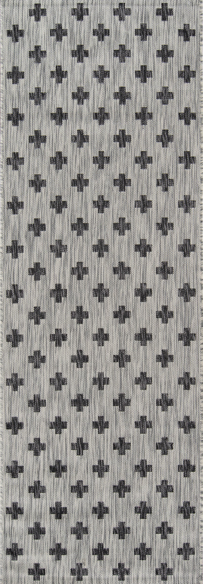 Grey woven fabric with small dark cross motifs and subtle stripes; geometric pattern for clothing or upholstery.