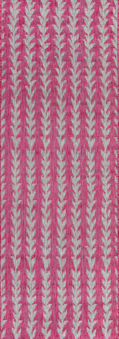 Pink fabric with vertical white leaf-like motifs in repeating columns; woven textile, bright and decorative.