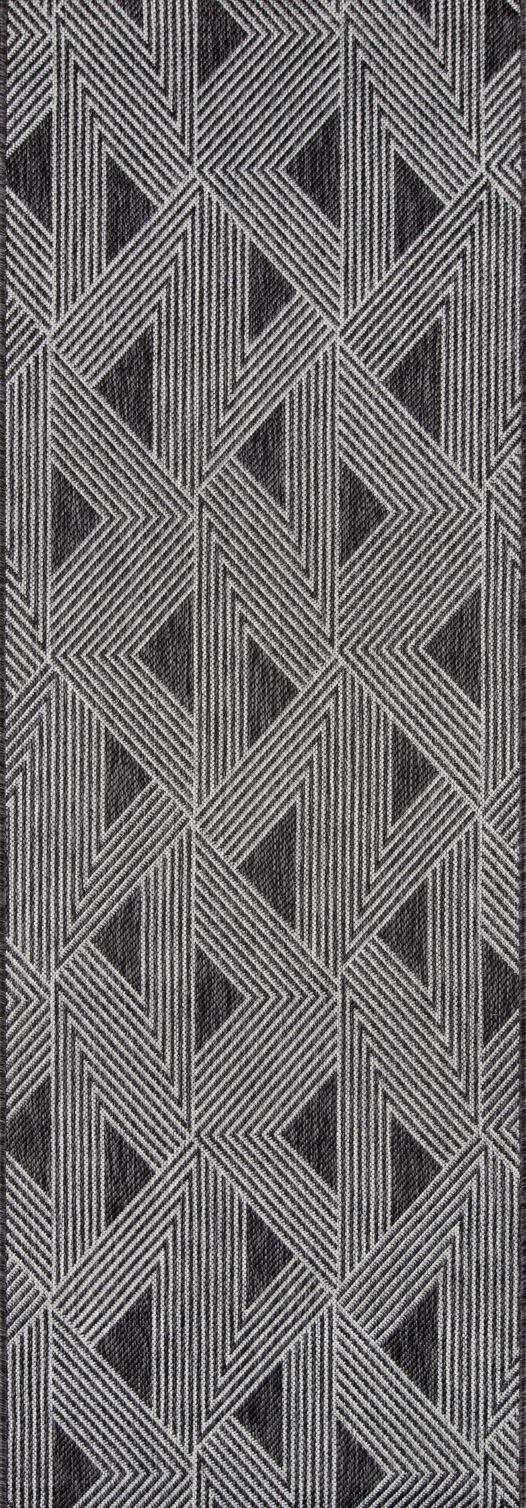Gray geometric chevron fabric with a woven texture; modern upholstery or drapery material.