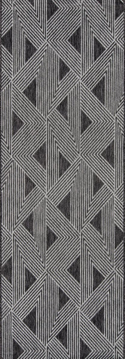 Gray geometric chevron fabric with a woven texture; modern upholstery or drapery material.