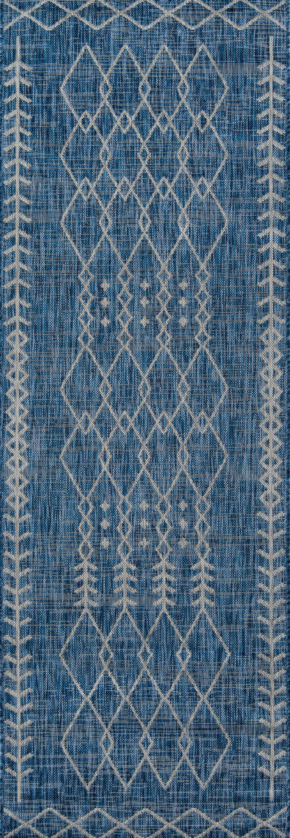 Blue woven rug with white diamond lattice pattern and geometric border; rectangular area rug for hallway decor.