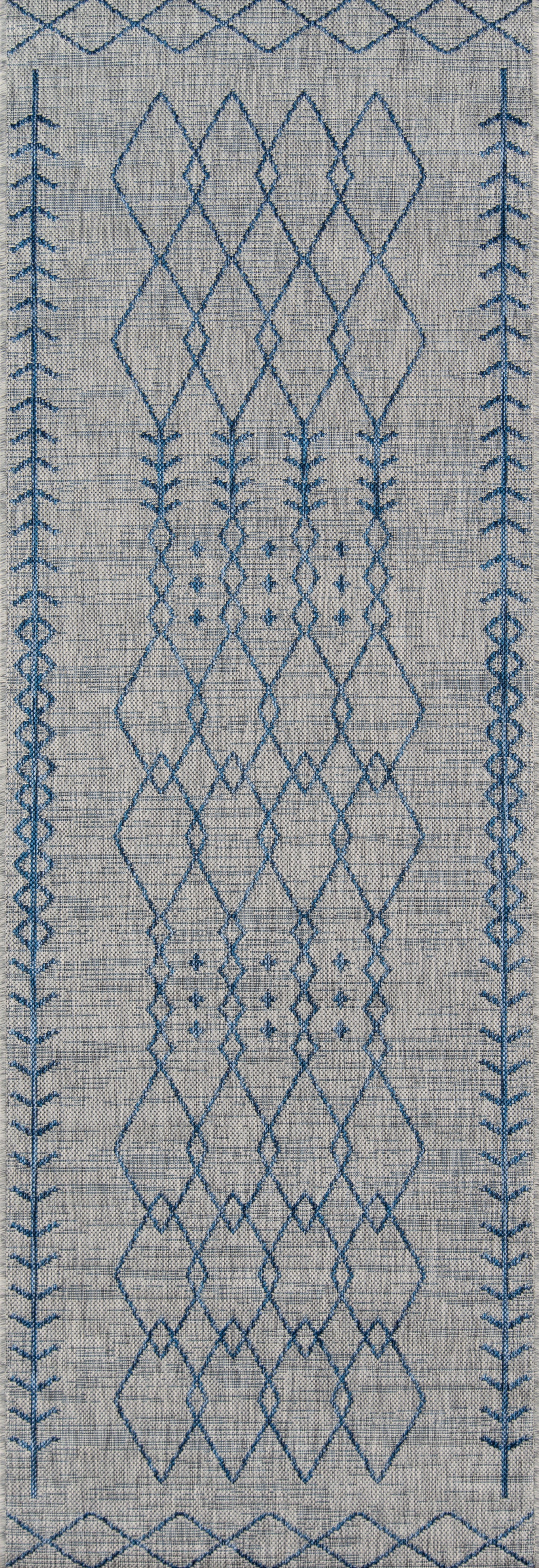 Gray linen runner rug with blue embroidered geometric diamonds and decorative border.