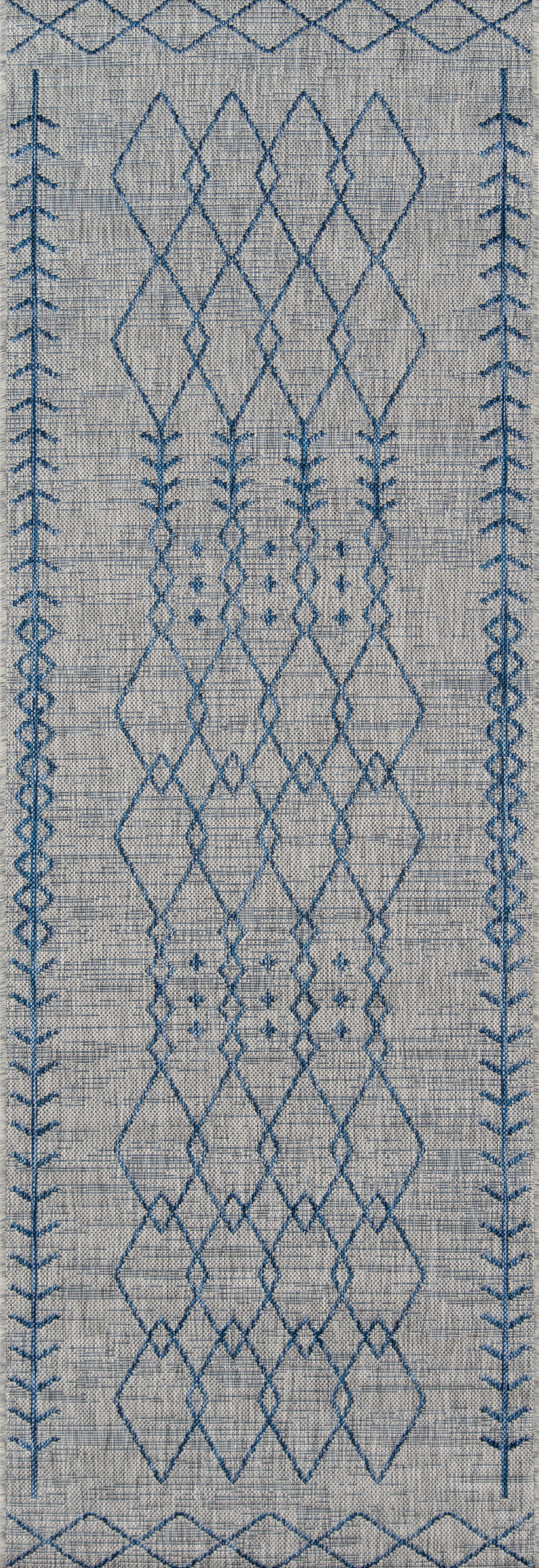 Gray woven area rug with blue geometric diamond lattice pattern and blue stitched border.