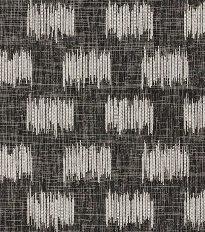 Villavi-inspired fabric pattern in charcoal and off-white with repeating vertical brushstroke blocks in a grid