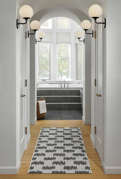 Rectangular rug on a hallway floor, 4' x 6'.