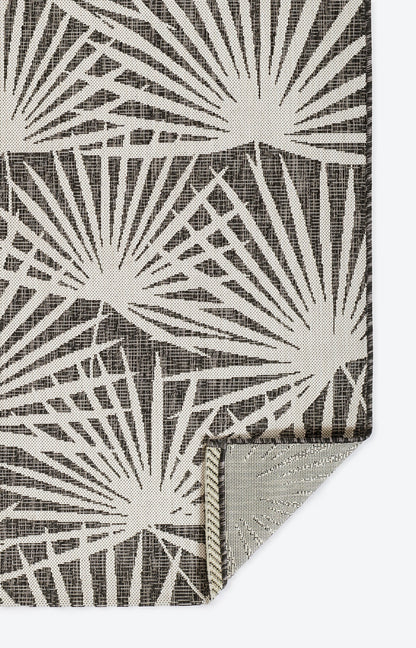 Gray rug runner with a white sunburst pattern; rectangular 2' x 6'.