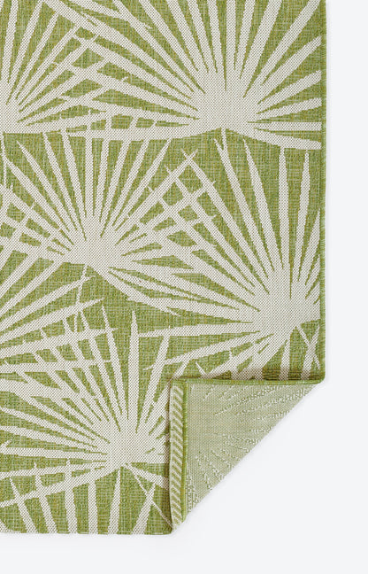 Green linen-look rug with a white sunburst geometric pattern; 2' x 3' rectangular rug.