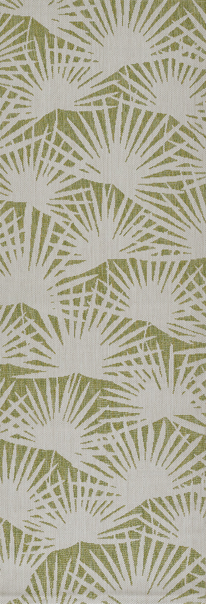 Cream sunburst pattern on olive-green textured rug; geometric, repeating design.