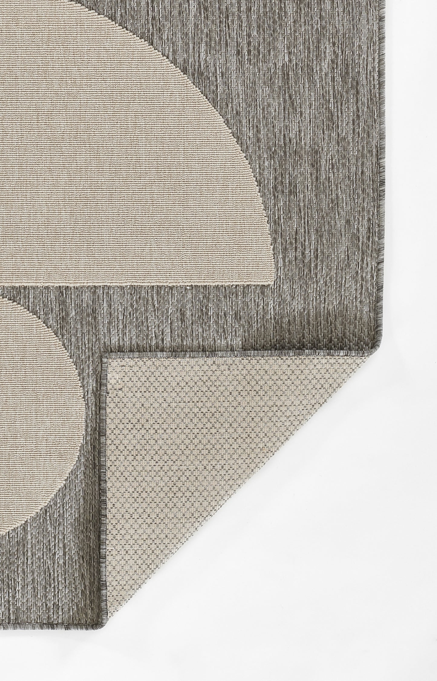 Gray geometric runner rug with beige circular and semi-circular shapes; corner-cut design.
