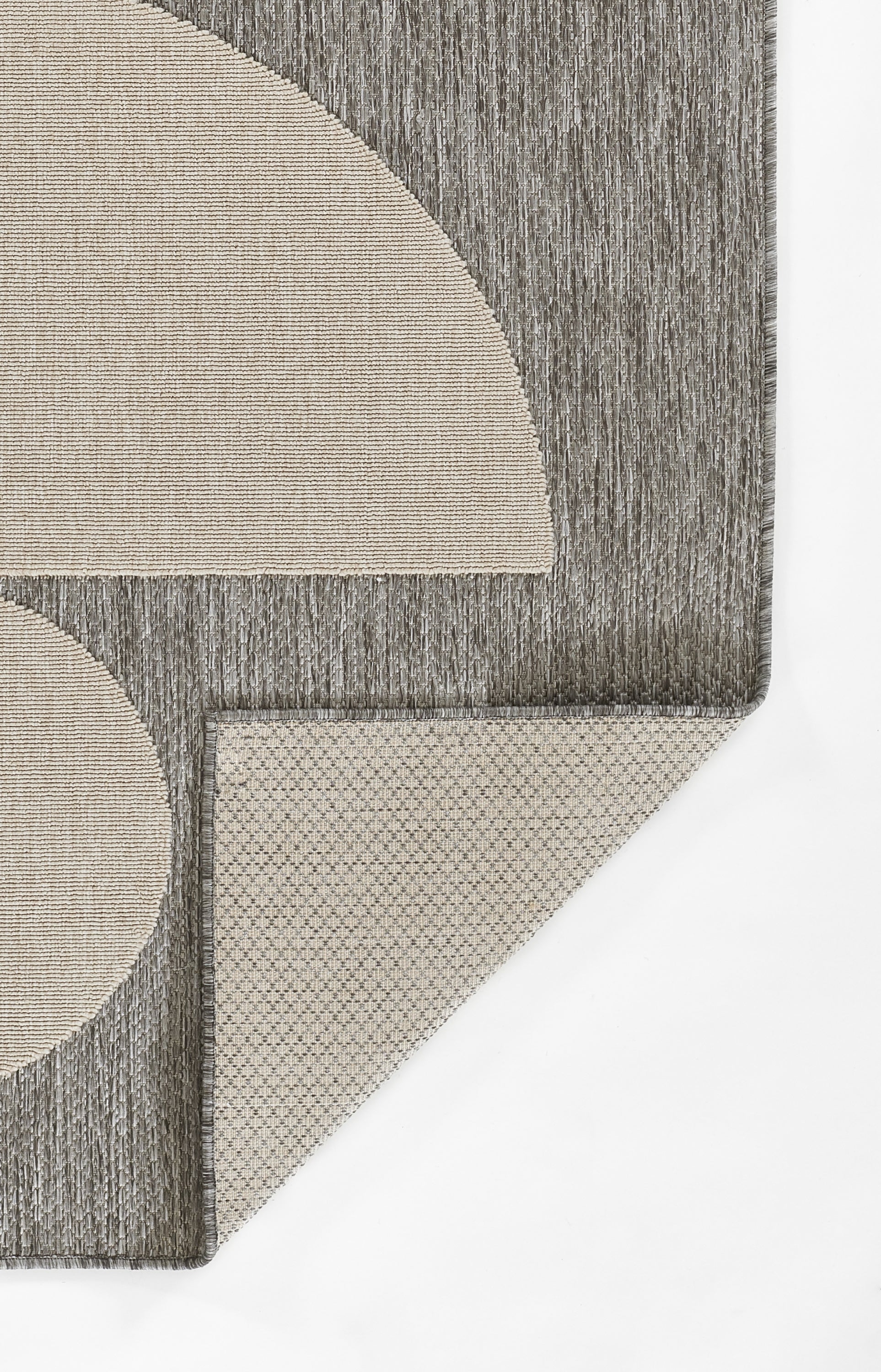 Gray geometric runner rug with beige circular and semi-circular shapes; corner-cut design.
