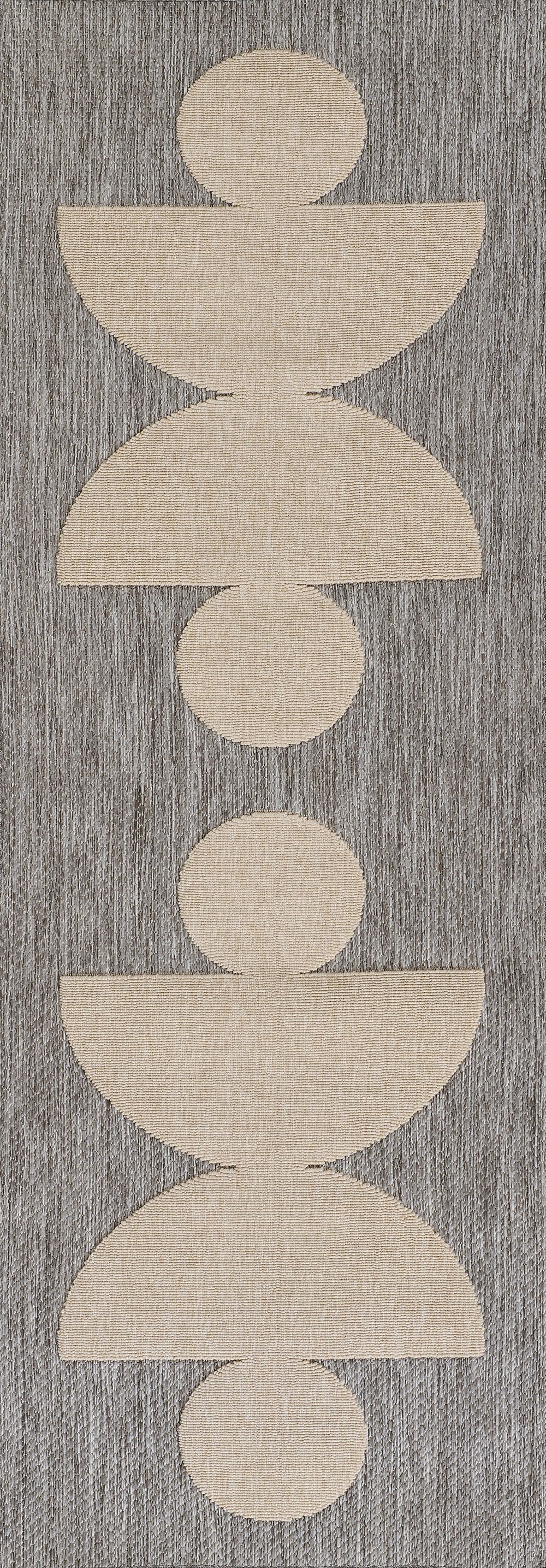 Grey textured rug runner with a vertical beige geometric pattern of stacked circles and semicircles, 3' x 8'.