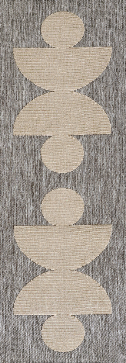 Grey textured rug runner with a vertical beige geometric pattern of stacked circles and semicircles, 3' x 8'.