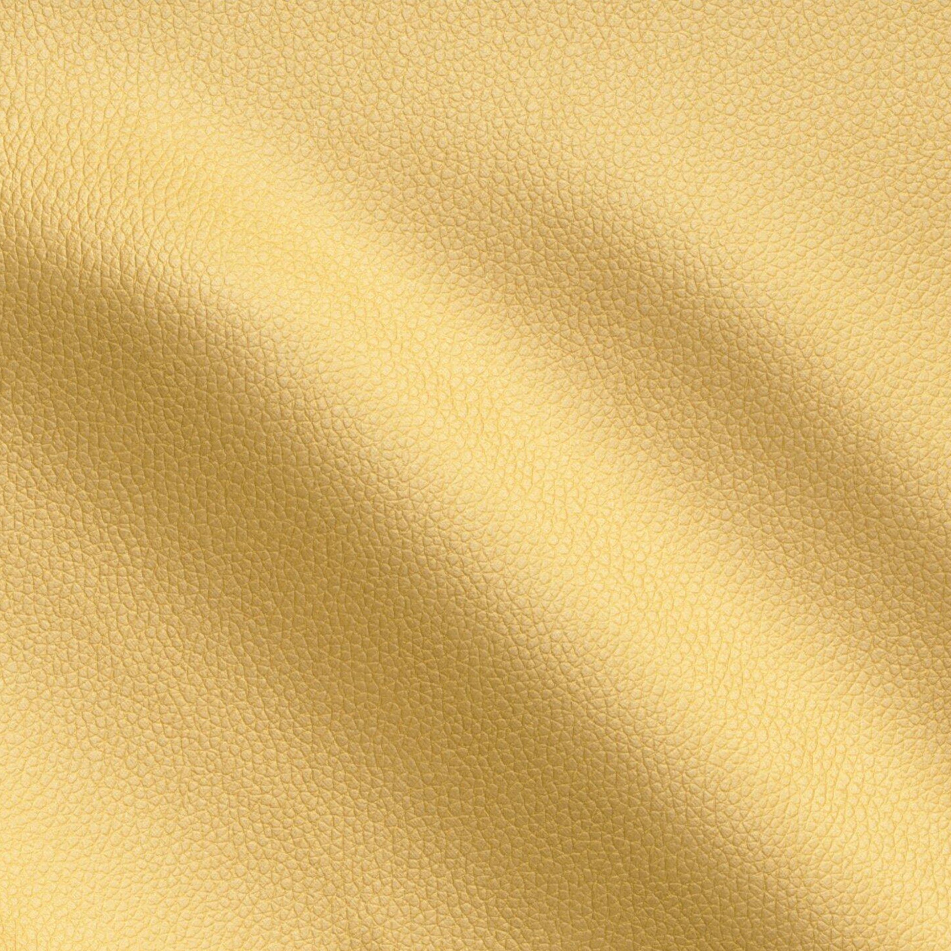 Yellow vinyl vegan leather with pebble grain texture and soft drape.