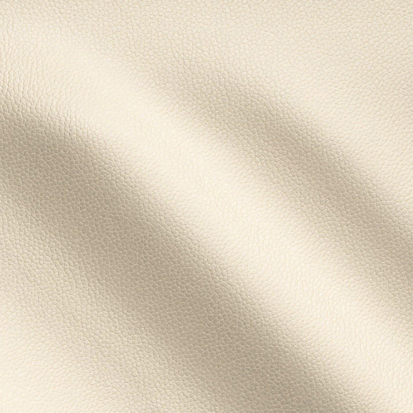 Cream-beige vegan leather vinyl fabric with a pebbled texture and soft draped folds.