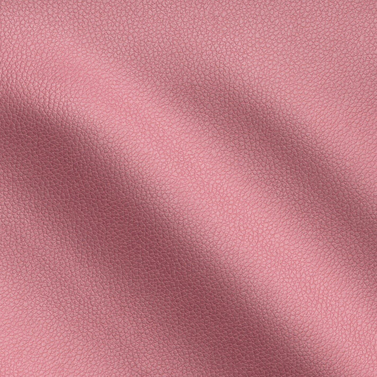 Close-up pink pebbled vegan leather texture with subtle creases.