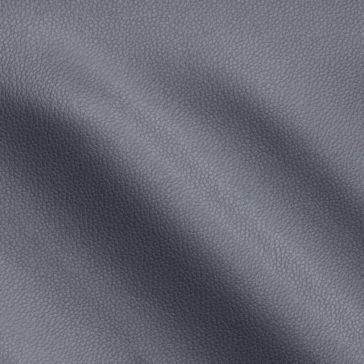 Navy blue pebbled vegan leather fabric with soft folds and subtle sheen.