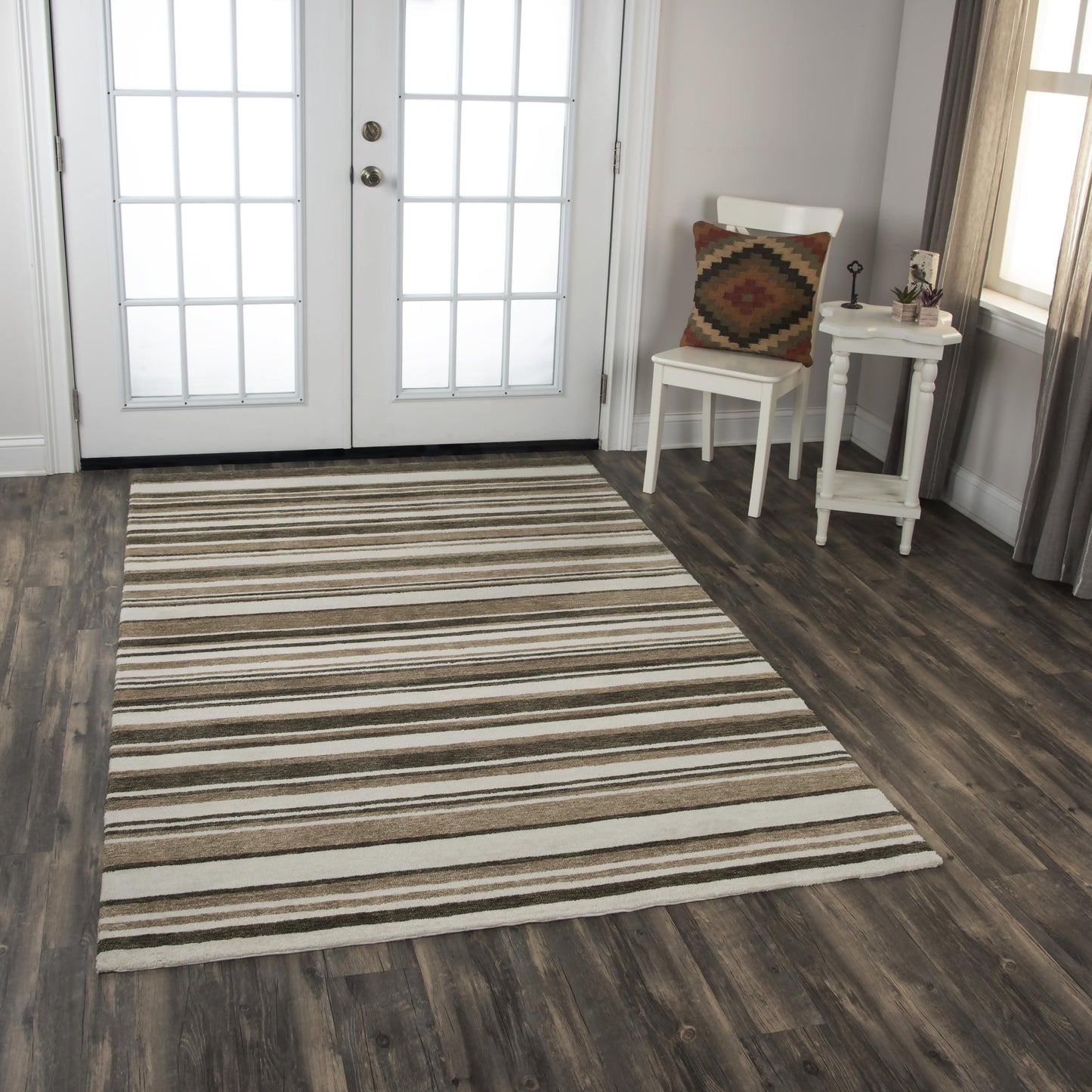 8' x 10' contemporary rug with a textured pattern.