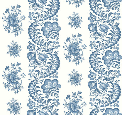 Blue and white damask floral wallpaper with ornate scrolling vines and large blossoms.