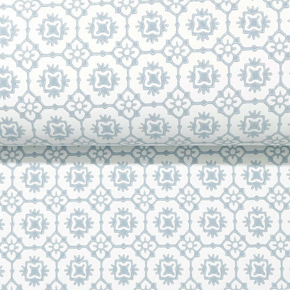 Pale blue geometric floral lattice with rosettes on white, repeating pattern with a rolled edge.