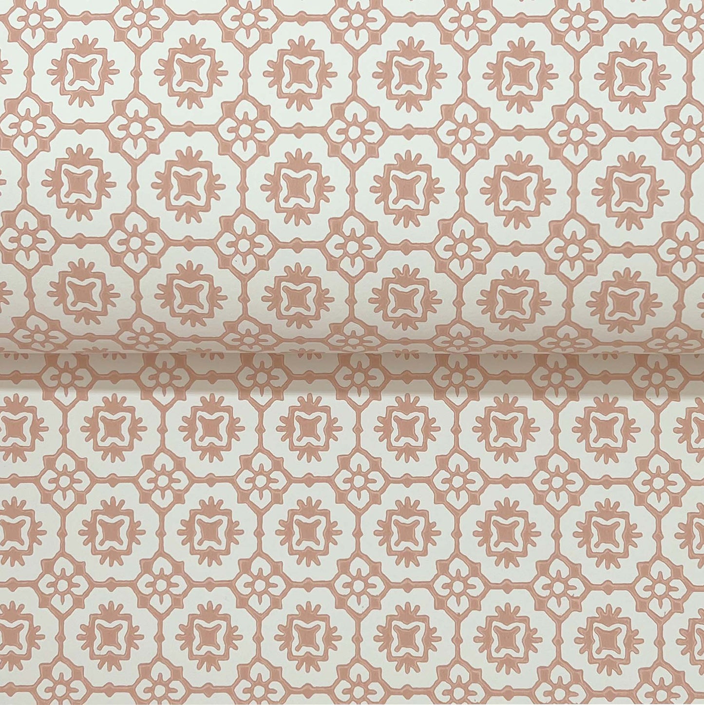 Peach-on-ivory geometric floral lattice wallpaper with rosette motifs; vintage tile-inspired decor.