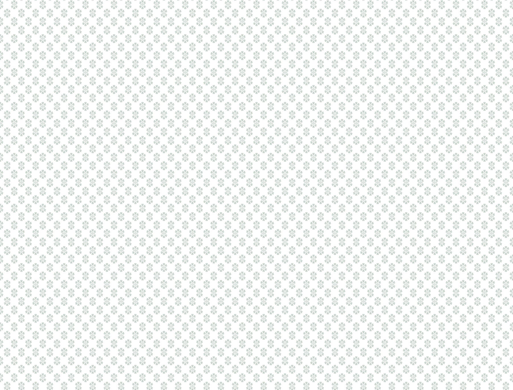 White textile with a subtle light-gray repeating quatrefoil floral pattern.