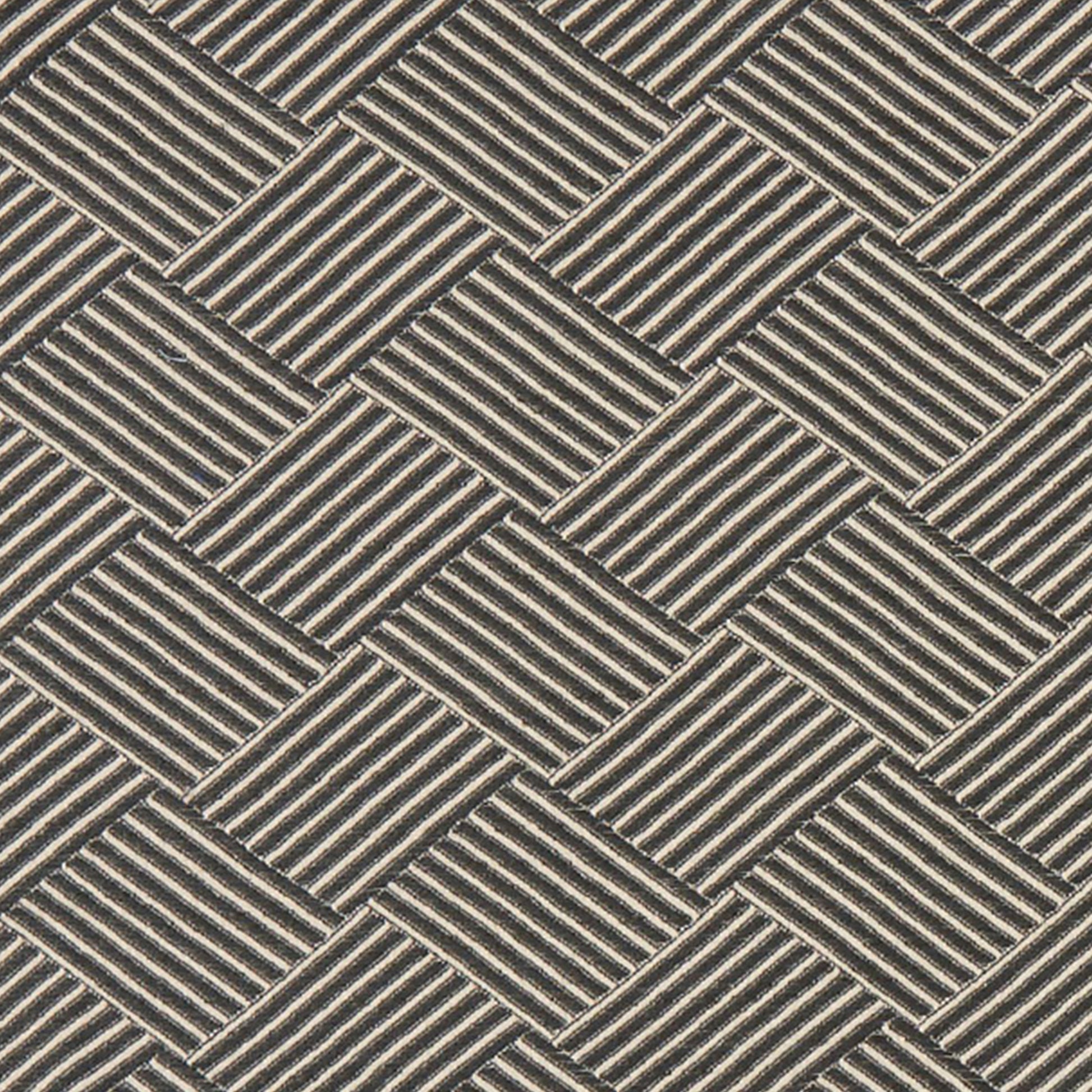 Grey/silver jacquard fabric with a geometric pattern and subtle texture.
