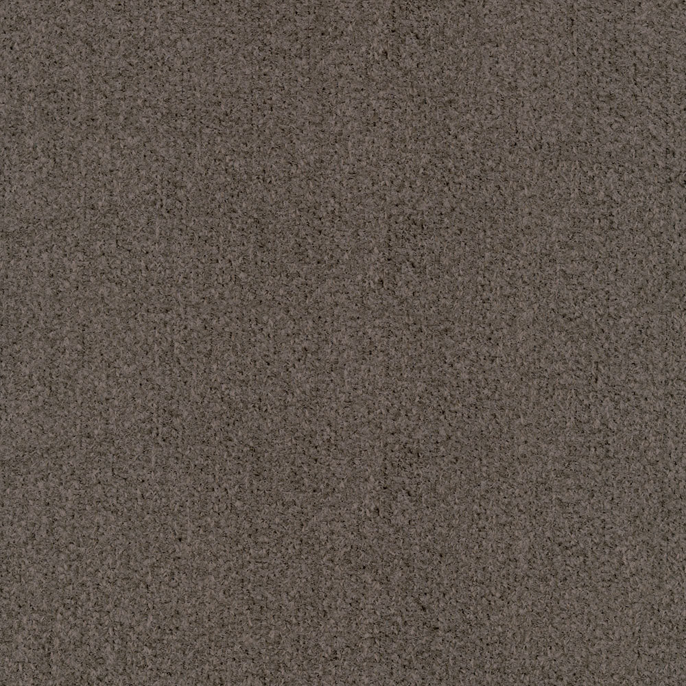 Close-up of coffee-colored fabric with a suede-like texture and speckled grain.
