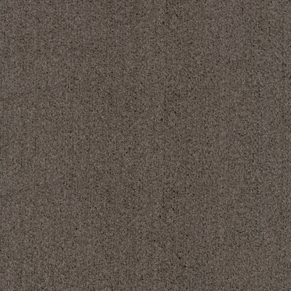 Close-up of coffee-colored fabric with a suede-like texture and speckled grain.