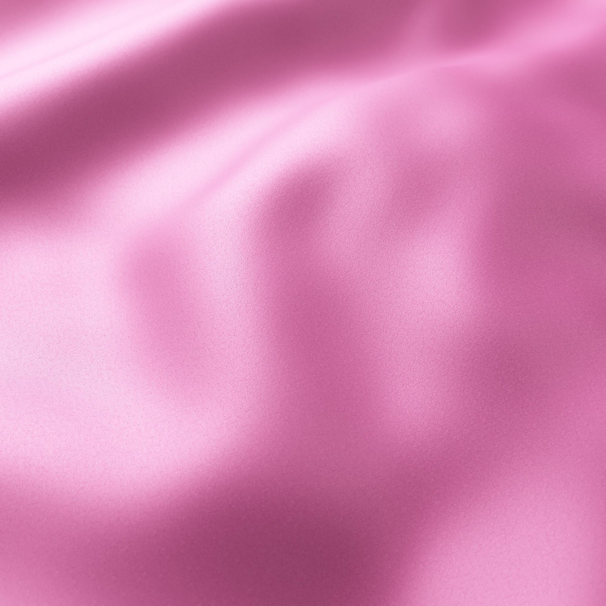 Pink sateen fabric with soft folds and glossy sheen, silky drape.
