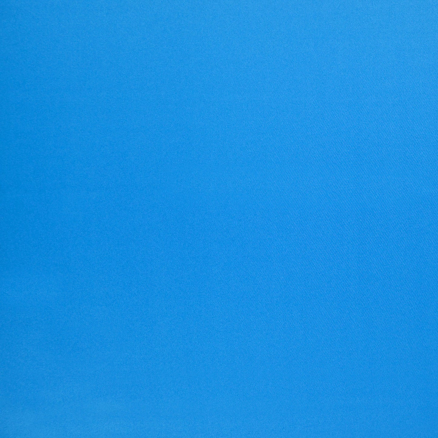 Solid royal blue fabric with subtle weave texture, smooth and versatile for clothing or home textiles.