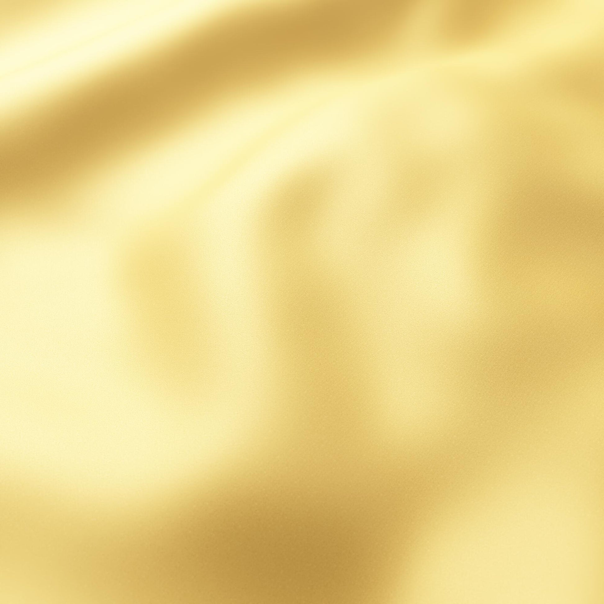 Shiny mustard yellow sateen fabric with gentle folds and warm, reflective sheen.