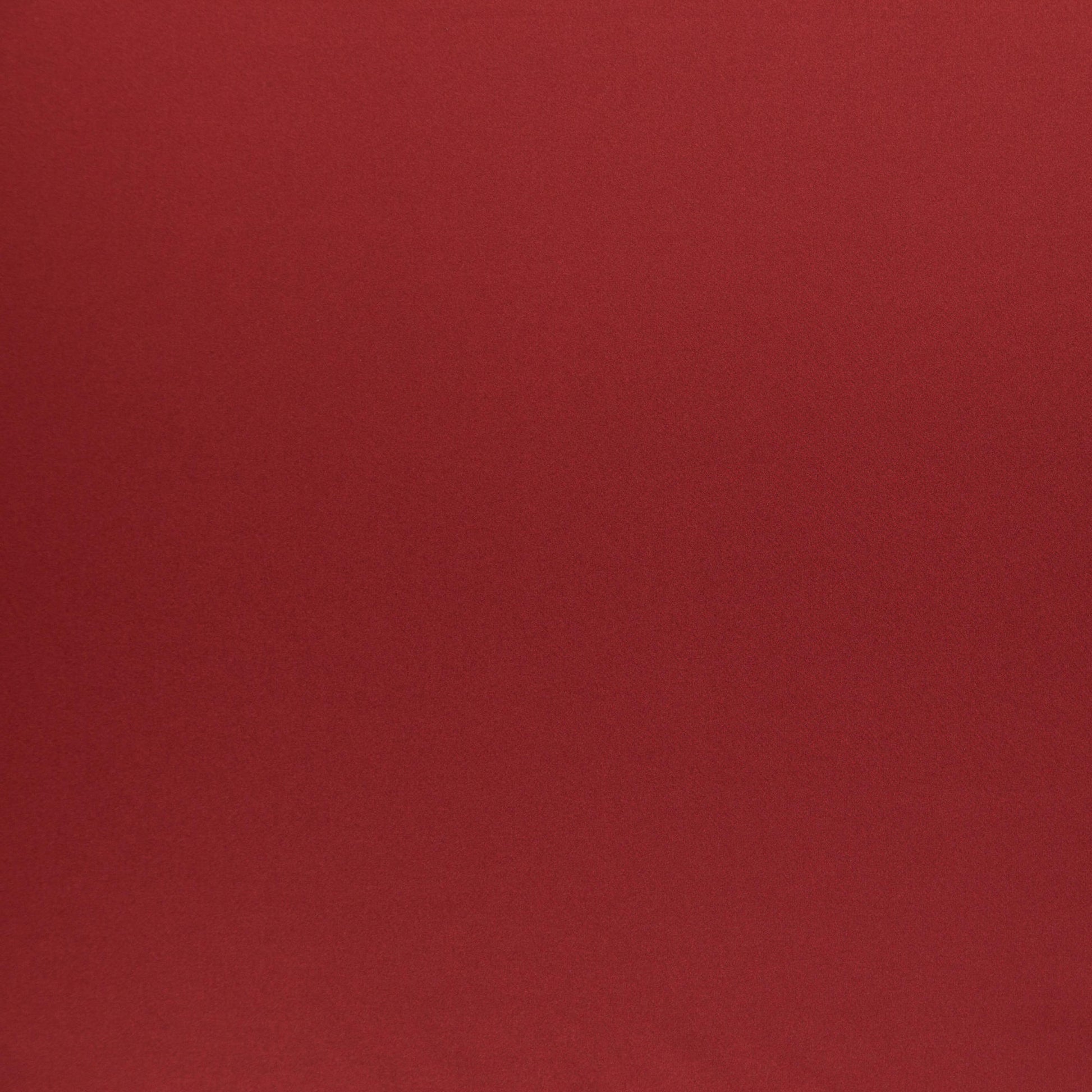 Solid burgundy fabric swatch with soft texture, ideal for clothing or home upholstery.