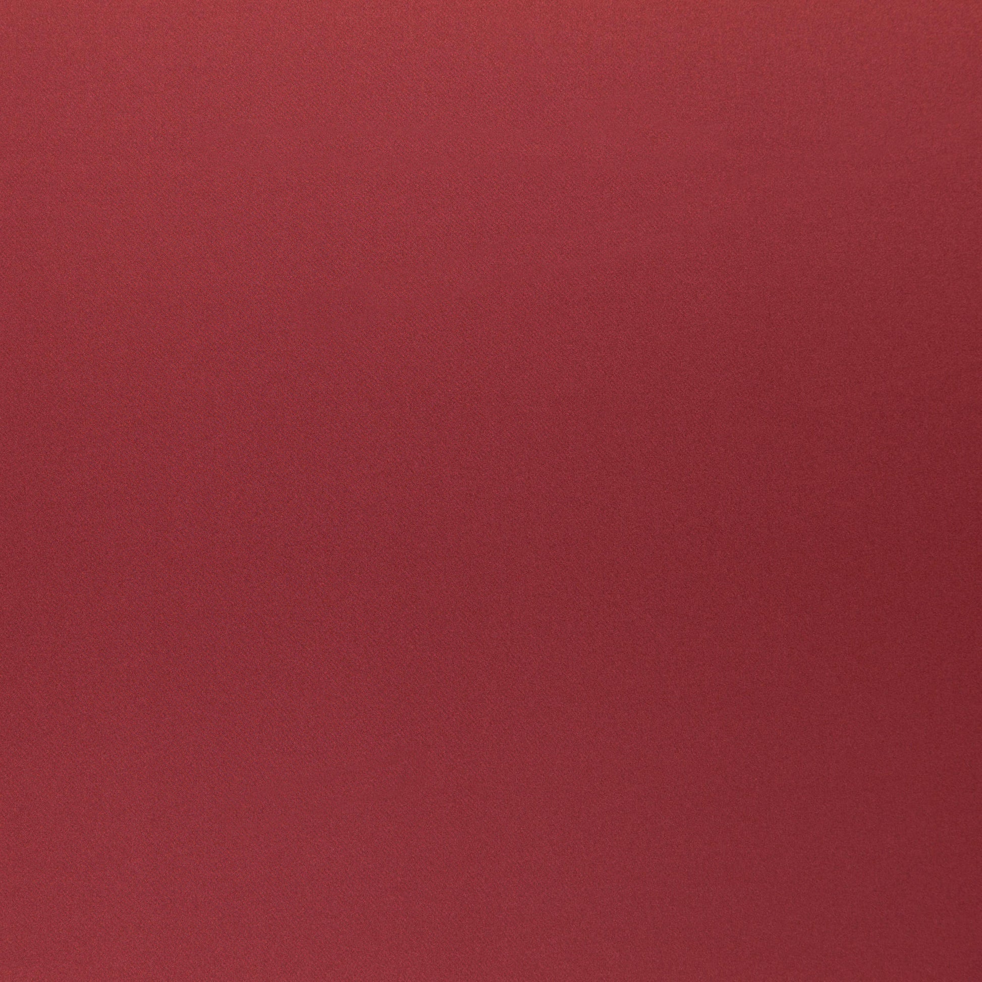Rich red suede-like fabric swatch with a soft matte texture, ideal for apparel or upholstery.