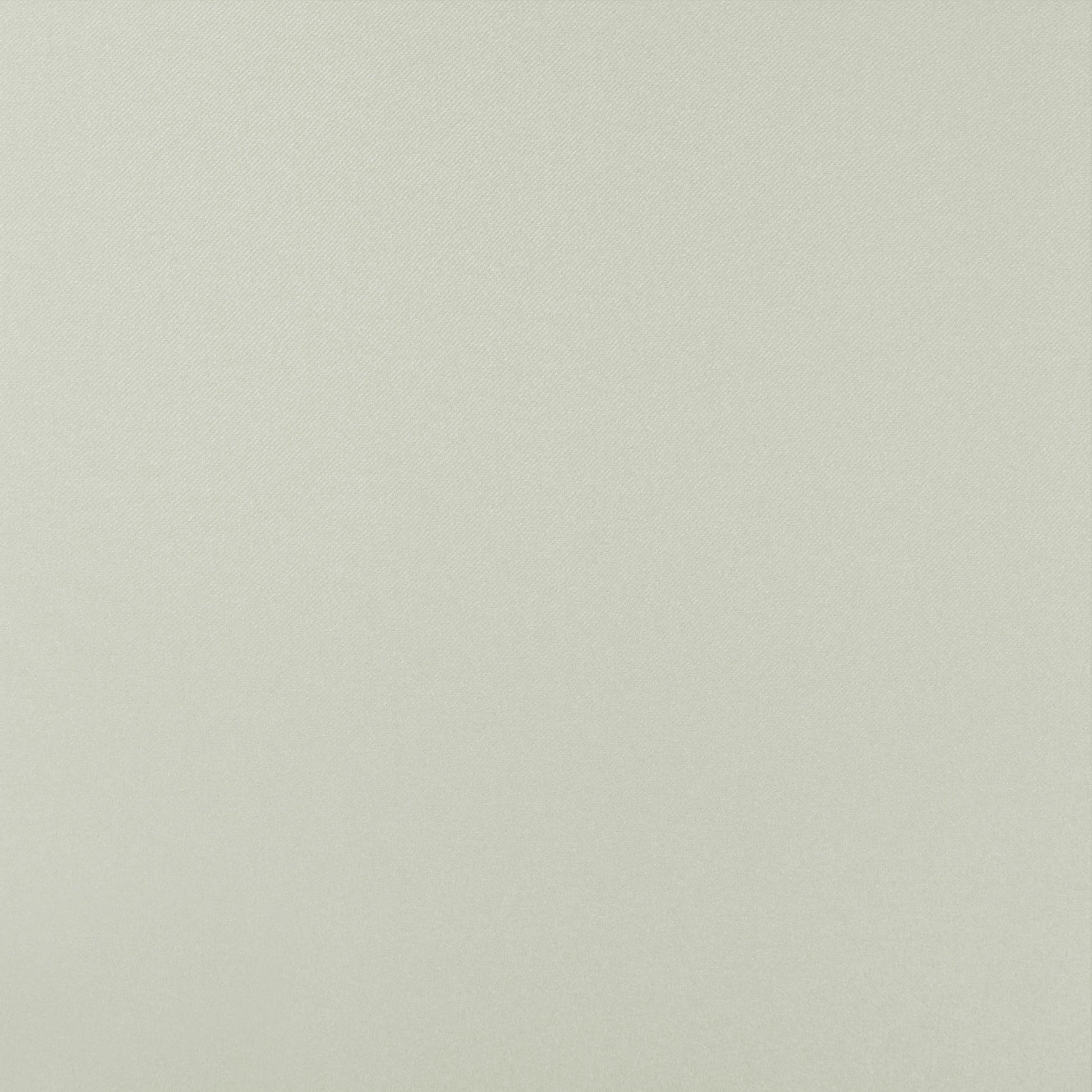 Cream textured fabric backdrop with subtle weave in soft neutral ivory.