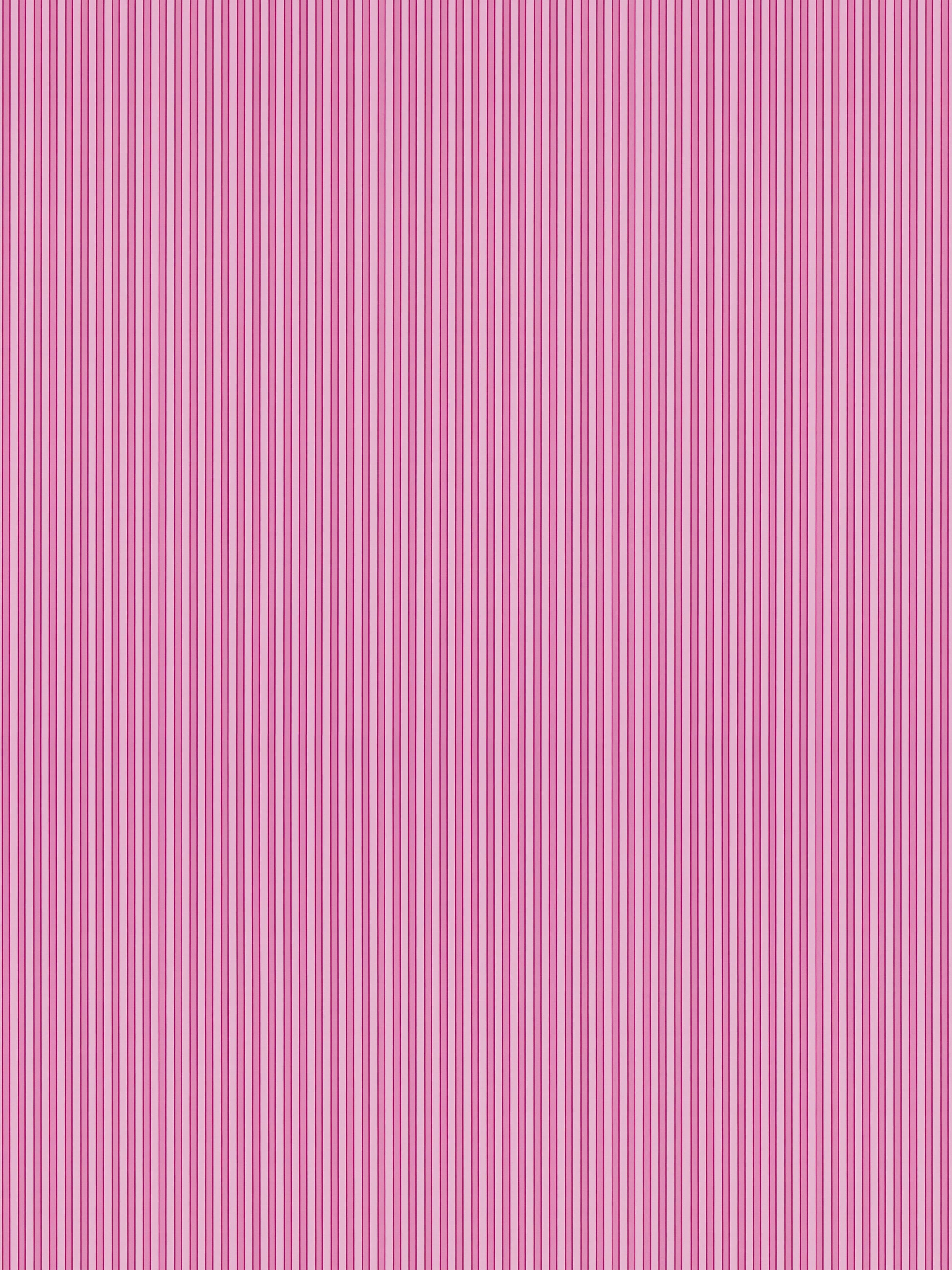 Decorative pink wallpaper with narrow vertical stripes in light and dark pink.