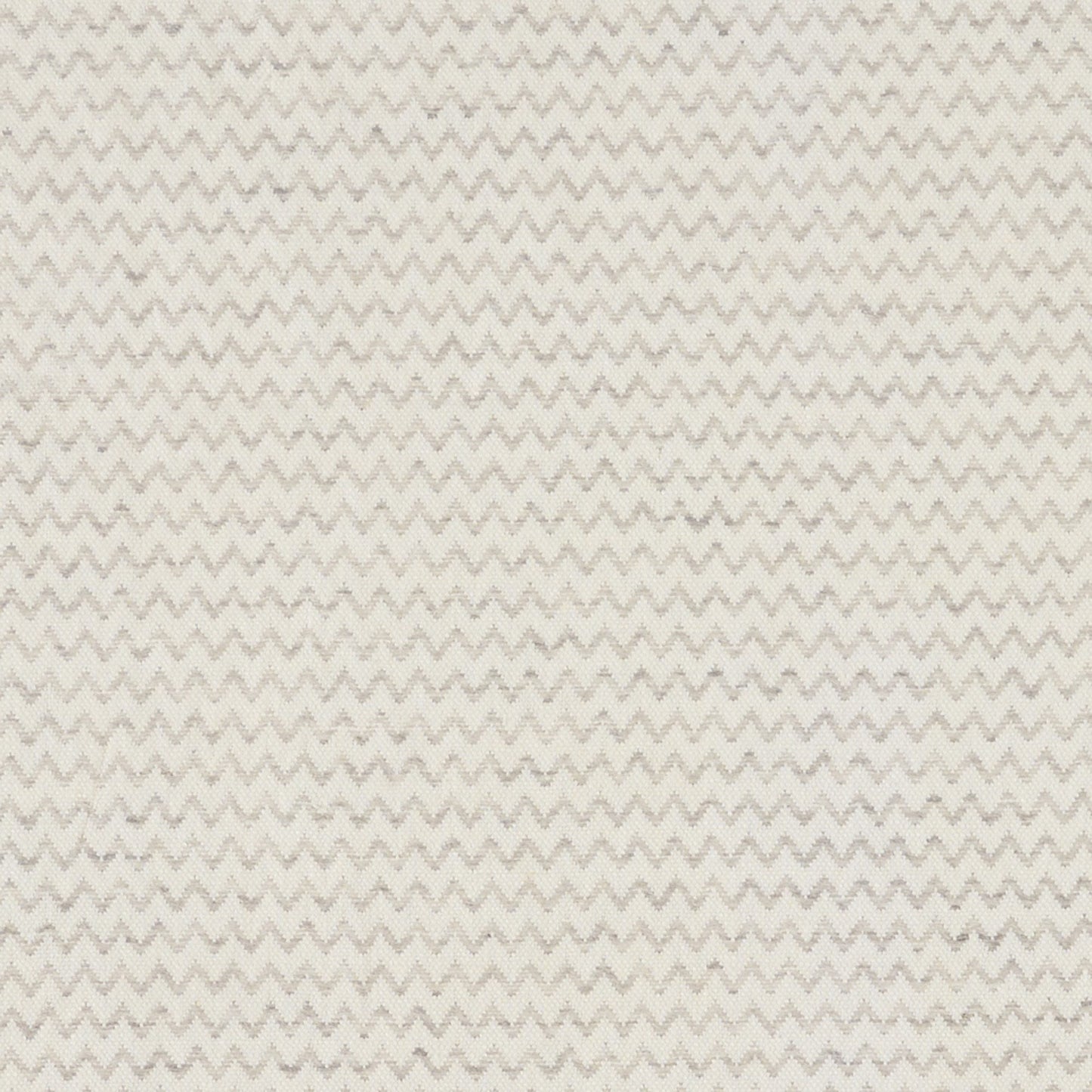 Cream and beige chevron zigzag fabric texture, soft woven textile for upholstery or home decor.
