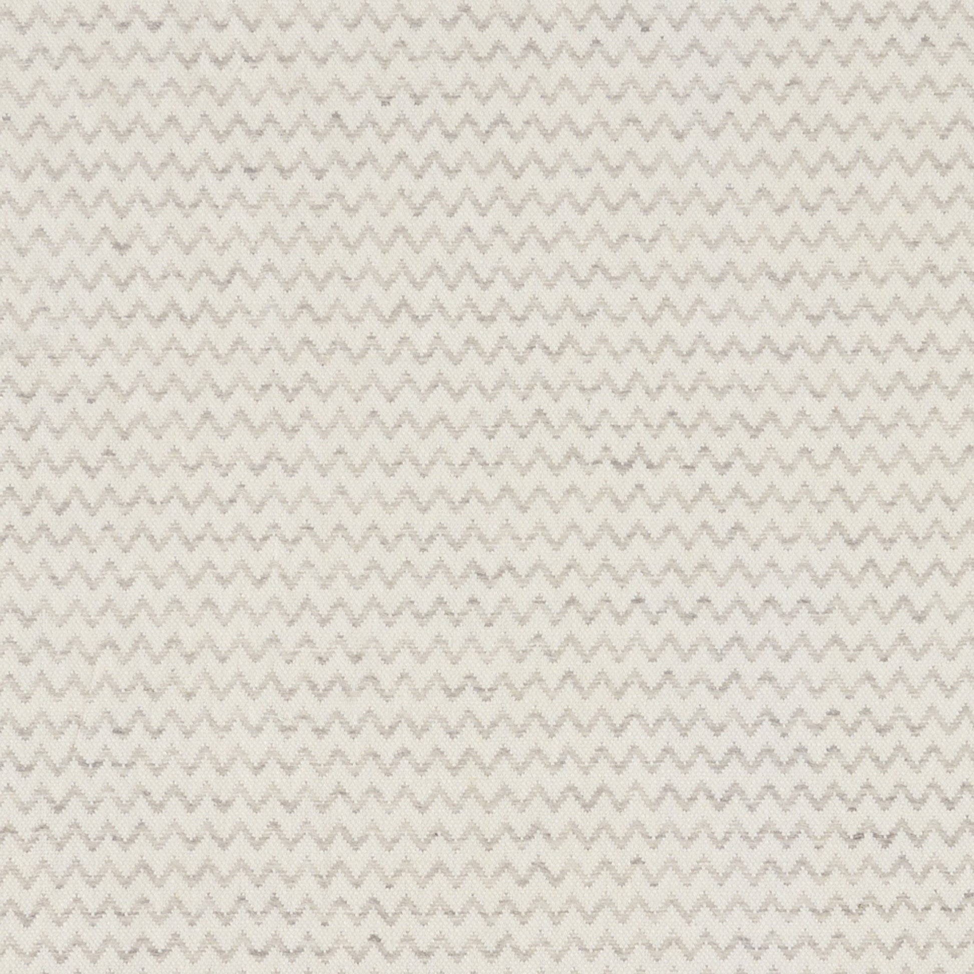 Cream and beige chevron zigzag fabric texture, soft woven textile for upholstery or home decor.