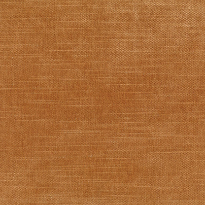 Copper solid fabric close-up with visible weave; warm rustic upholstery material.