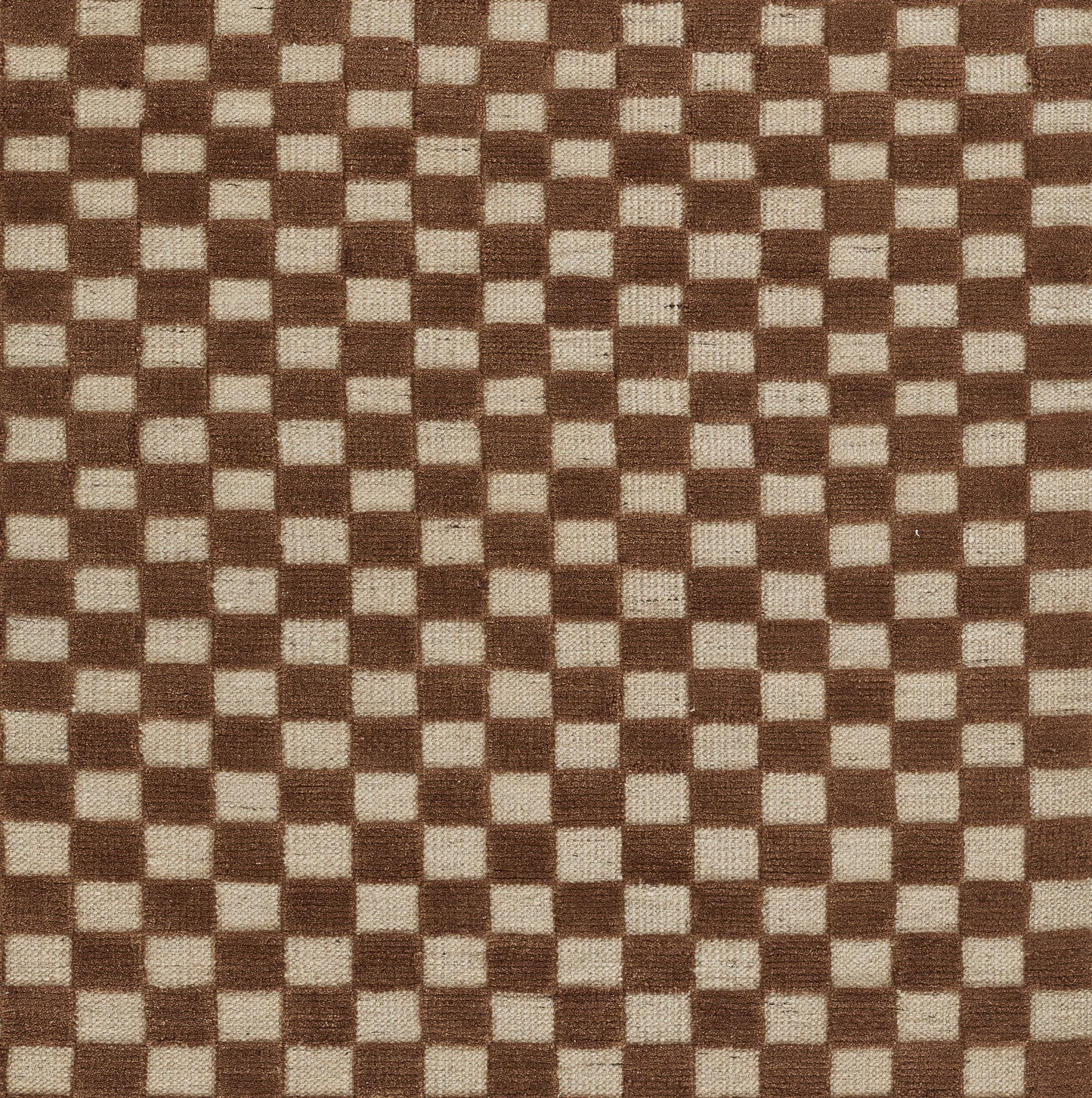 Brown and beige checkered rug with a small square gingham pattern.
