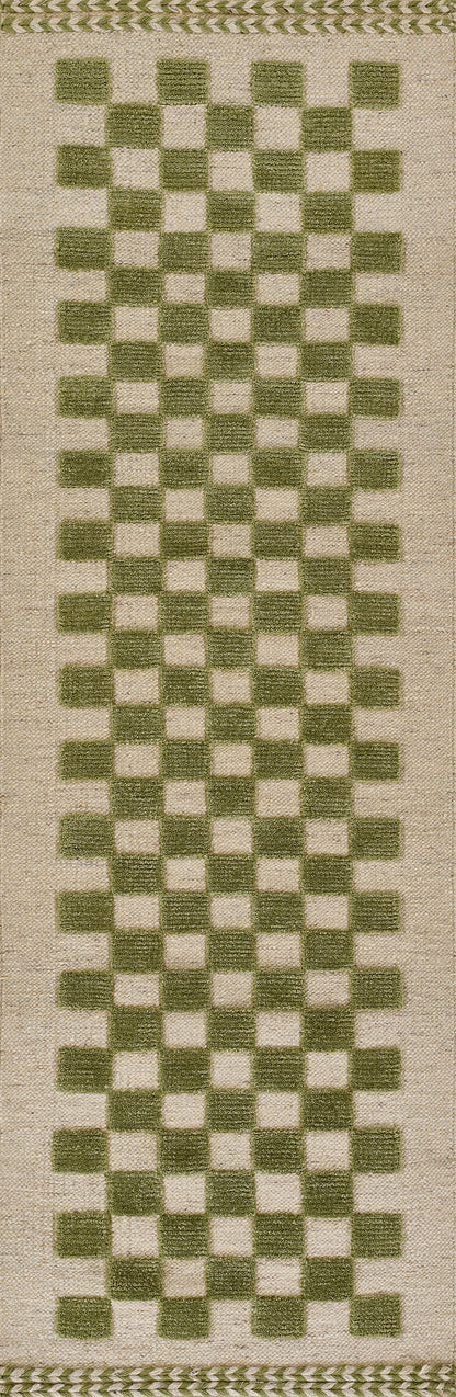 Long narrow woven rug runner with olive-green checkerboard squares on natural beige, top edge with gold braided trim.