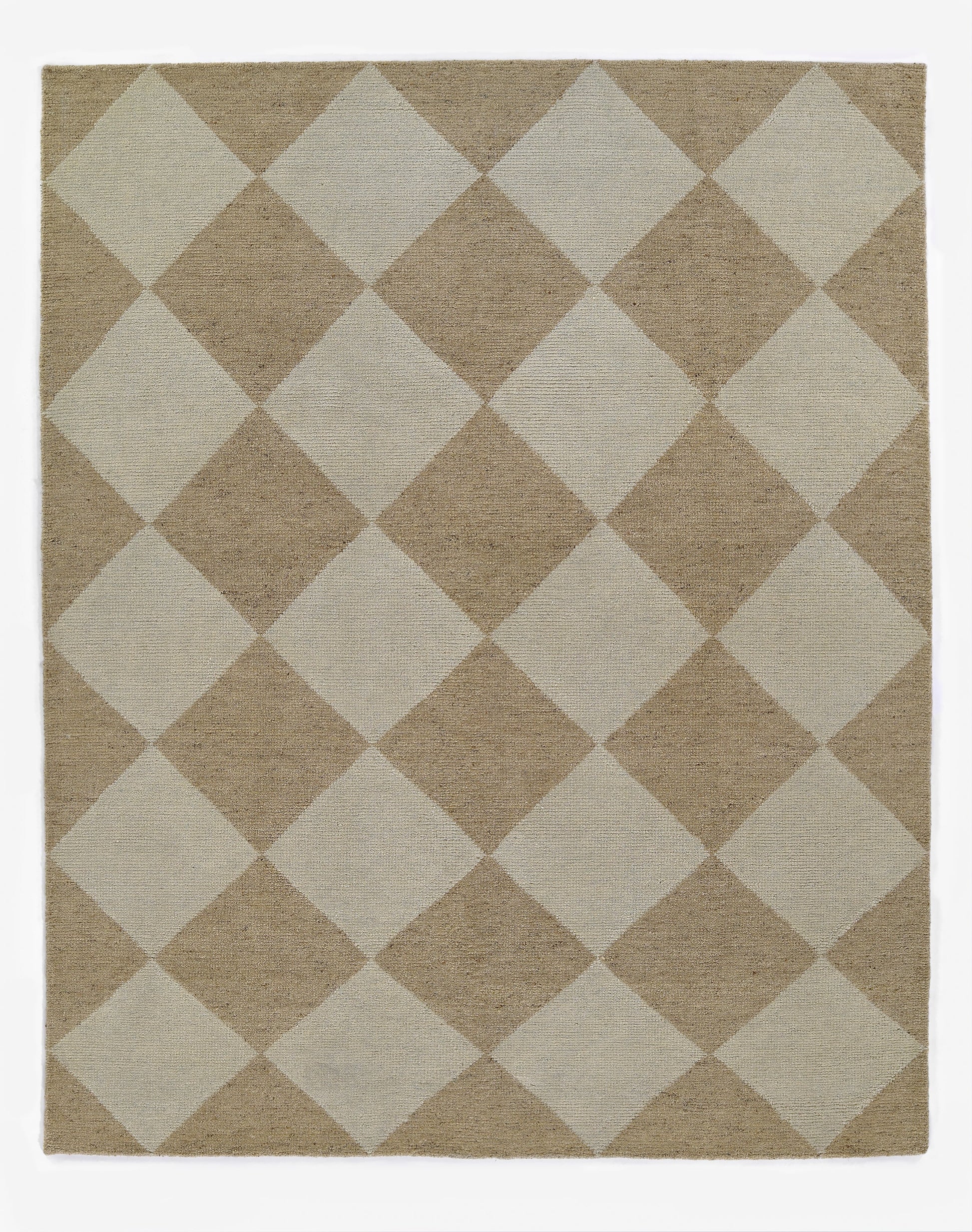Rectangular woven rug in beige & ivory with a large diamond pattern; neutral, textured, geometric decor.