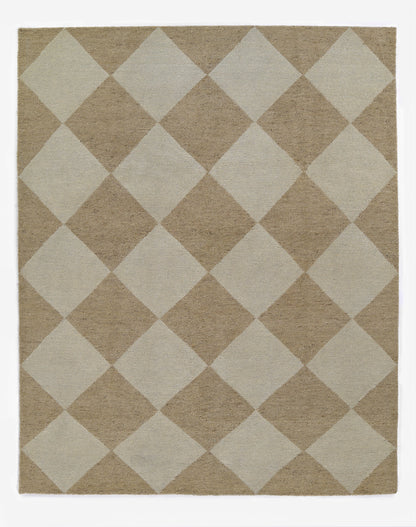 Rectangular woven rug in beige & ivory with a large diamond pattern; neutral, textured, geometric decor.