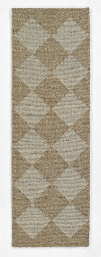 Long beige hallway runner rug with tan and light beige diamond argyle pattern and woven texture.