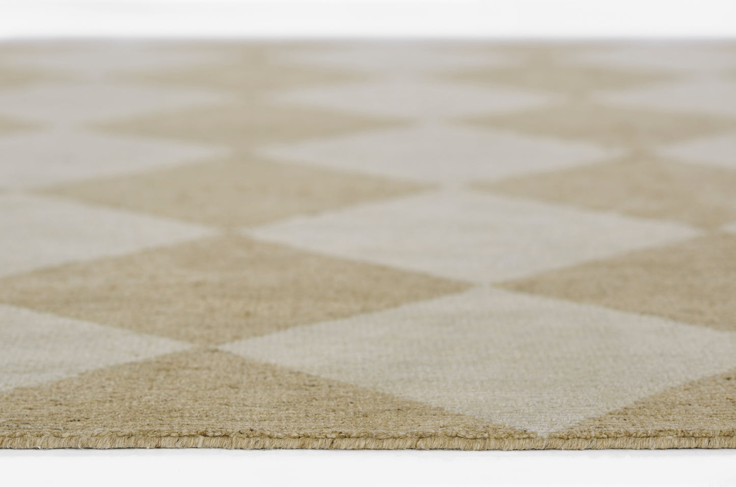 Beige and ivory diamond-pattern flat-weave rug with low pile; modern area rug for living room.