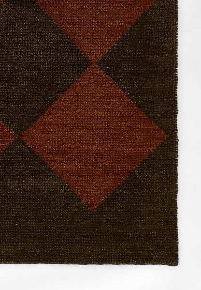 Dark brown woven runner rug with rust diamond motifs and a textured geometric pattern.