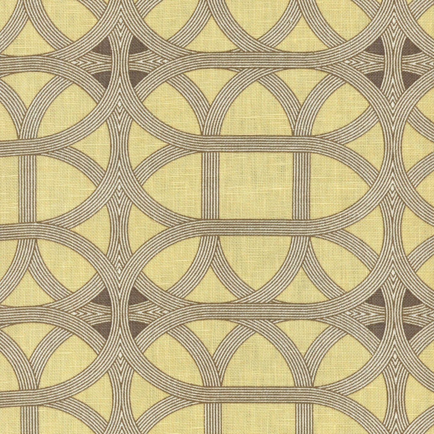 Yellow linen-textured fabric with brown intertwined looping arches forming circular oval patterns; retro geometric style.