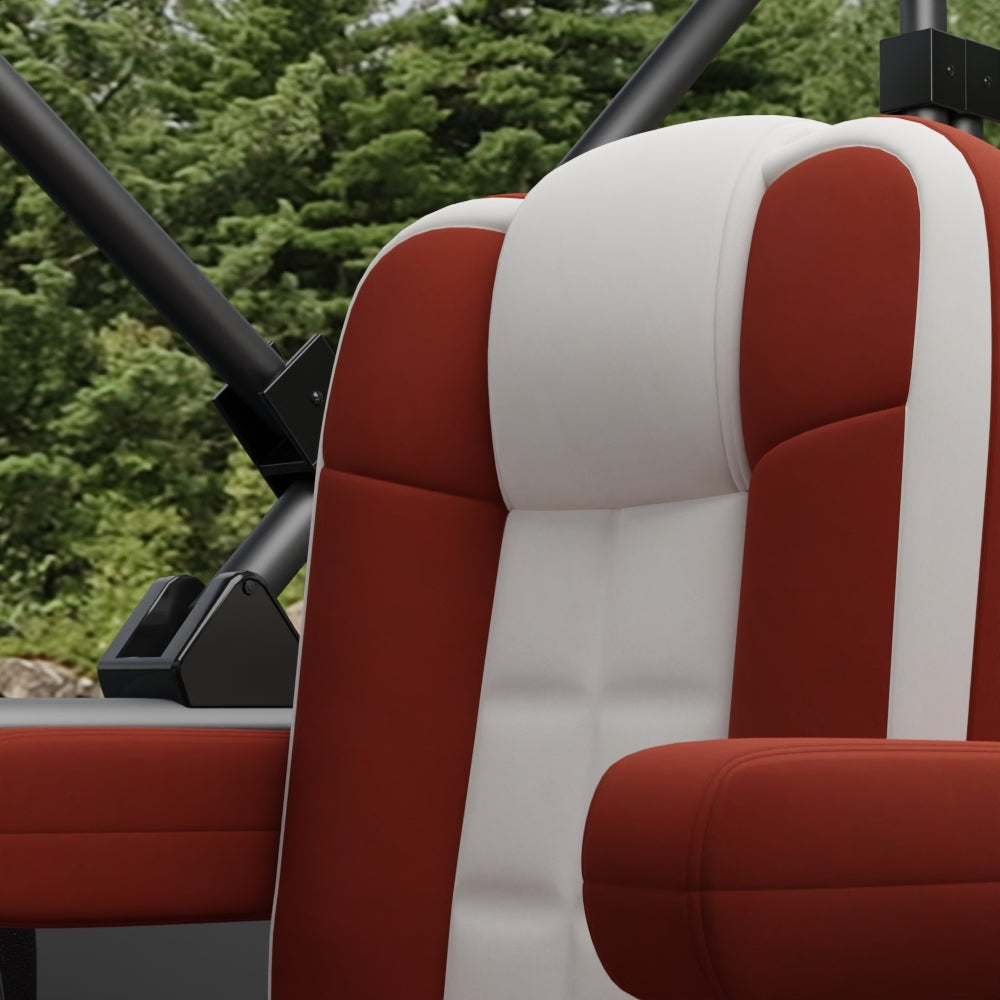 Orange solid fabric car seat upholstery with contoured cushions in a vehicle interior.